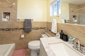 Hair dryer, towels, soap, shampoo