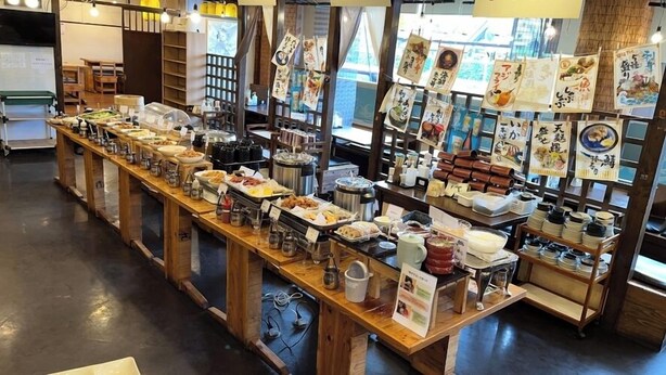 A buffet setup with various food items and condiments. - Hotel Alpha-One Izumo (Izumo)