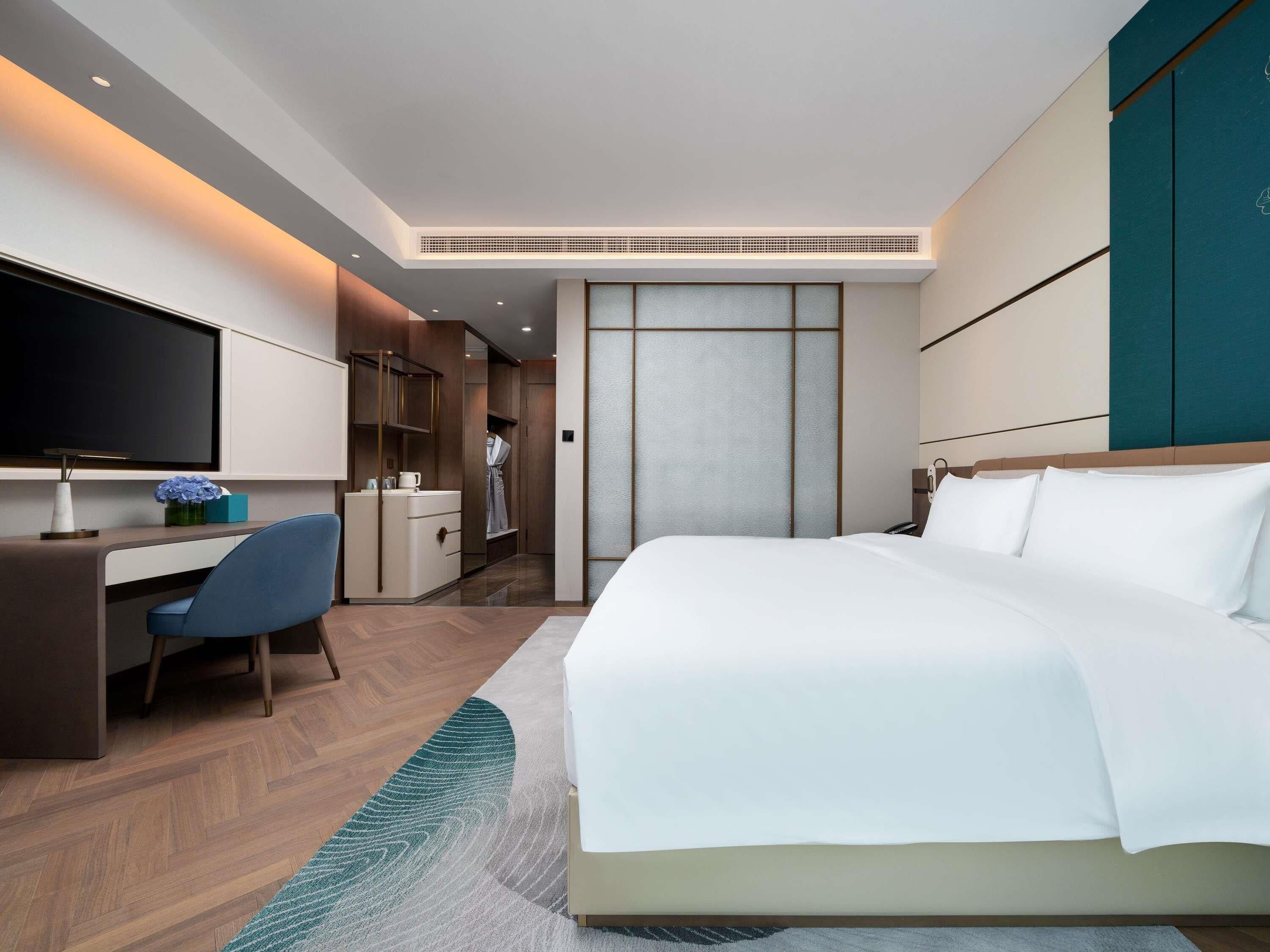 Superior kamer, 1 kingsize bed | Luxe beddengoed, donsdekens, een minibar, een kluis op de kamer