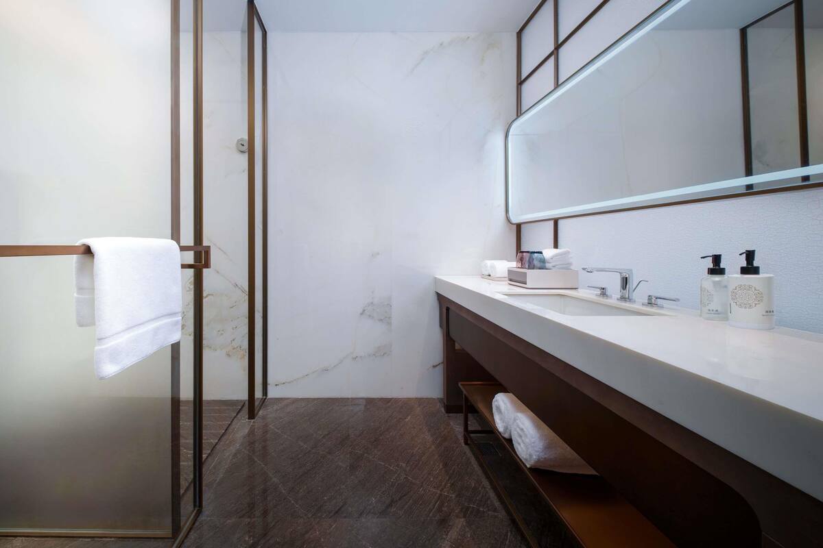 Premium bedding, down duvets, minibar, in-room safe