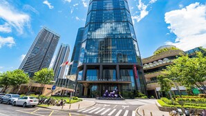 A modern building with the sign "Grand Mercury" at the entrance. - Grand Mercure Shenzhen Guangming (Shenzhen)
