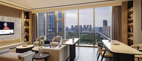 Premium bedding, down comforters, in-room safe, laptop workspace