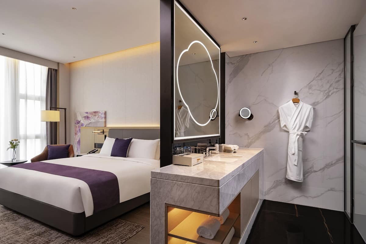 Premium bedding, down comforters, in-room safe, laptop workspace