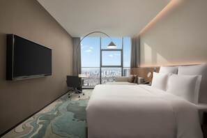 Executive kamer, 1 kingsize bed | Donsdekens, pillowtop-bedden, een kluis op de kamer