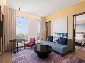Junior Suite with King bed, city view, 15% F&B discount, 4 pieces laundry