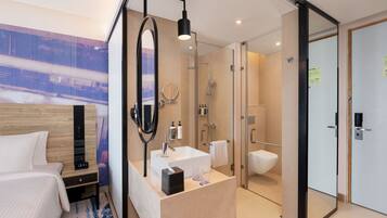 Bathrobes, slippers, bidet, towels