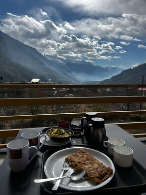 Elite Room | Balcony view - Wander Thrives Inn By Ads (Manali)
