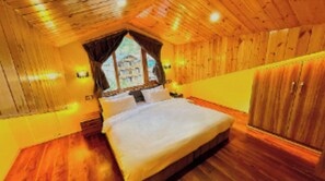 Family Triple Room | Living area | 80-inch flat-screen TV with cable channels - Wander Thrives Inn By Ads (Manali)