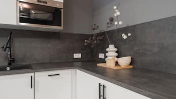 Réfrigérateur, four, plaque de cuisson, lave-vaisselle