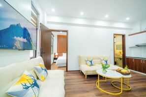 Family Apartment, 1 King Bed, Balcony, City View | Living area - Villa Hanh Phuc Bai Chay (Ha Long)