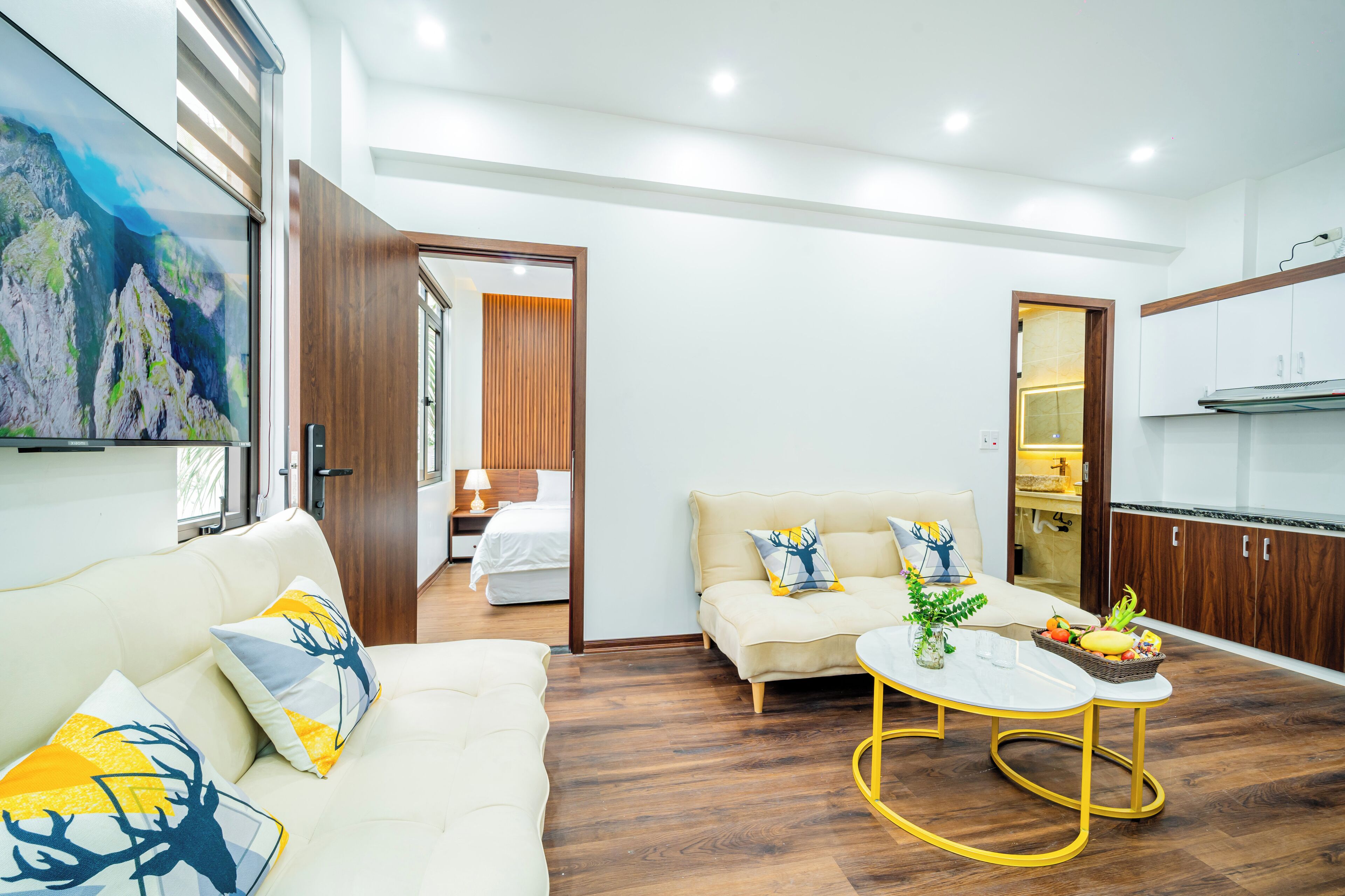 Family Apartment, 1 King Bed, Balcony, City View | Living area | Smart TV