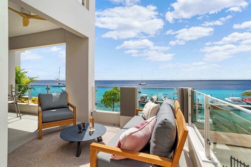 Seaview Caribe with sea view a shared pool and sunsets from your private balcony