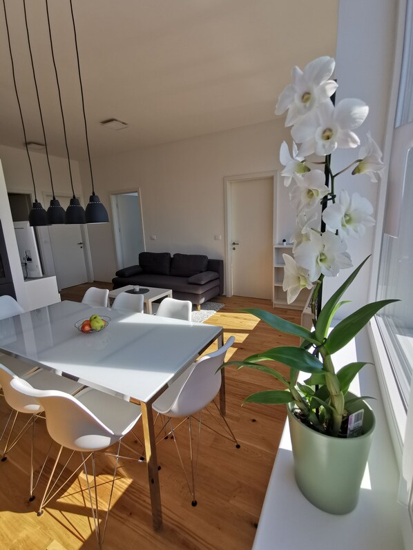 Comfort Apartment, 3 Bedrooms, City View | Living area | Flat-screen TV