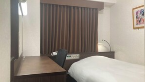 A hotel room with a bed, a desk, a chair, a telephone, and a window with curtains. - Hotel Alpha-One Yamaguchi Inter (Yamaguchi)