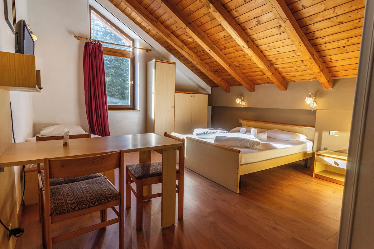 Chambre Triple, balcon