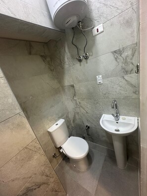 Shower, hair dryer, soap, shampoo