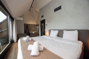 Habitación Deluxe doble | Cunas (de pago), wifi gratis, ropa de cama