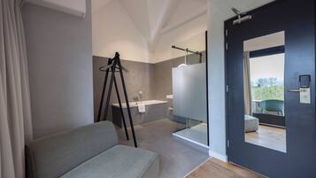 Deluxe tweepersoonskamer | Badkamer | Handdoeken, zeep, shampoo, toiletpapier