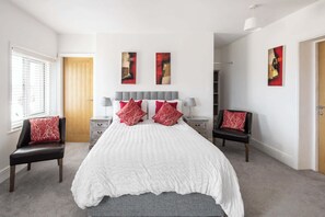 مكواة/لوح كي وملاءات أسرّة