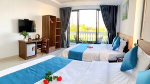 A hotel room with two beds, a desk with a TV, a mini-fridge, and a balcony with a view. - EasyLife Villa Hoi An (Da Nang)