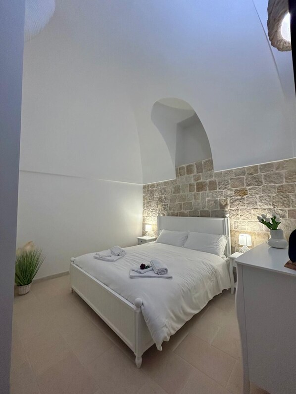 2 chambres, coffres-forts dans les chambres, fer et planche à repasser