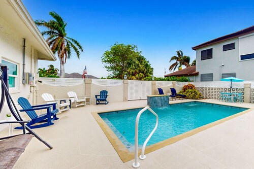 Gorgeous waterfront home with private pool, dock and outdoor space