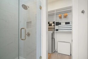 Shower, hair dryer, towels, soap