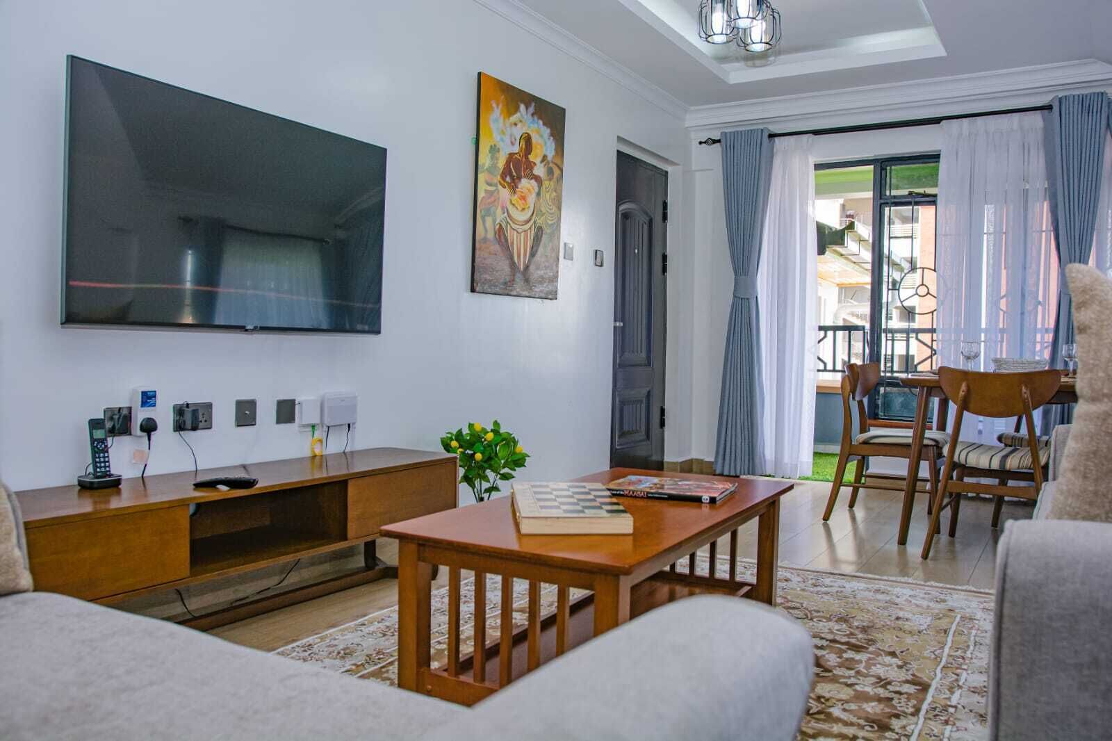 Apartemen Mewah, balkon, pemandangan kota | Area keluarga | TV layar datar