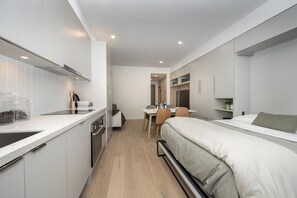 1 bedroom, desk, iron/ironing board, travel cot