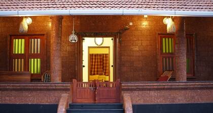 "Welcome to Malabar Serenity: Where Tradition Meets Tranquility"