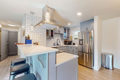 Family-friendly home near Seward Park in Seattle with patio, gas grill and Wifi