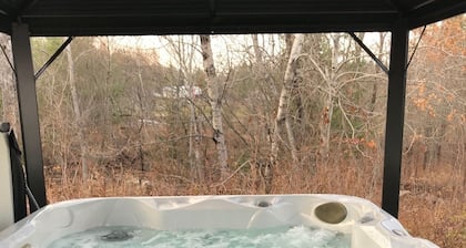 Nature retreat with Chalet le Petit Muguet | Riverfront and spa