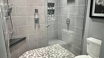 Shower, hair dryer, towels, soap