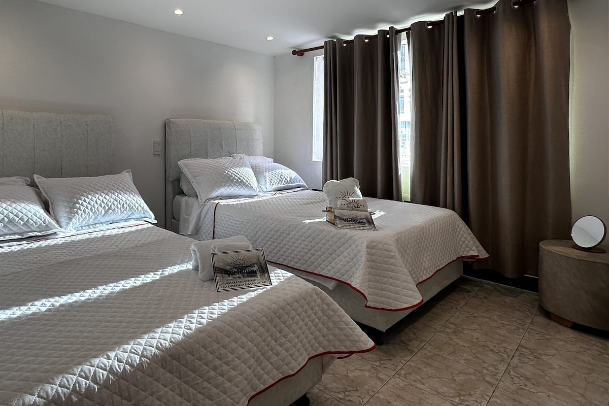 Standard Quadruple Room, City View | 1 bedroom, soundproofing, iron/ironing board, free WiFi
