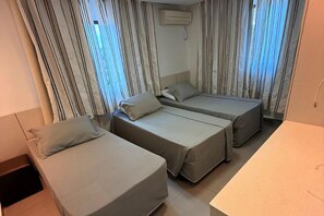 Premium Triple Room | Bathroom | Shower, free toiletries, towels, soap