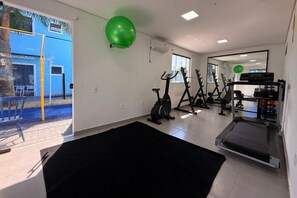 TV, books - Hotel Mais Lazer (Joinville)