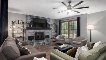 Smart TV, fireplace, table tennis, books