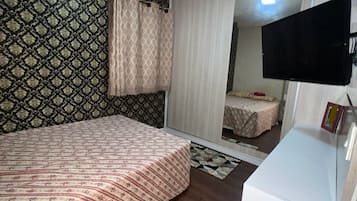2 quartos, ferros/tábuas de passar roupa, Wi-Fi, roupa de cama