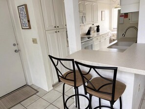 Fridge, microwave, oven, stovetop - Rooftop Vibes – 2BR Loft in Tamarind on Manasota (Englewood)