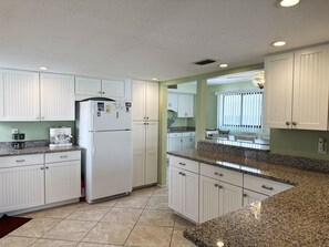 Coffee/tea maker, fridge, microwave, oven - Bayside 2BR Condo at Tamarind - Private Sun Deck (Englewood)