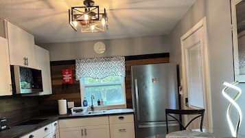 Fridge, oven, coffee/tea maker, toaster