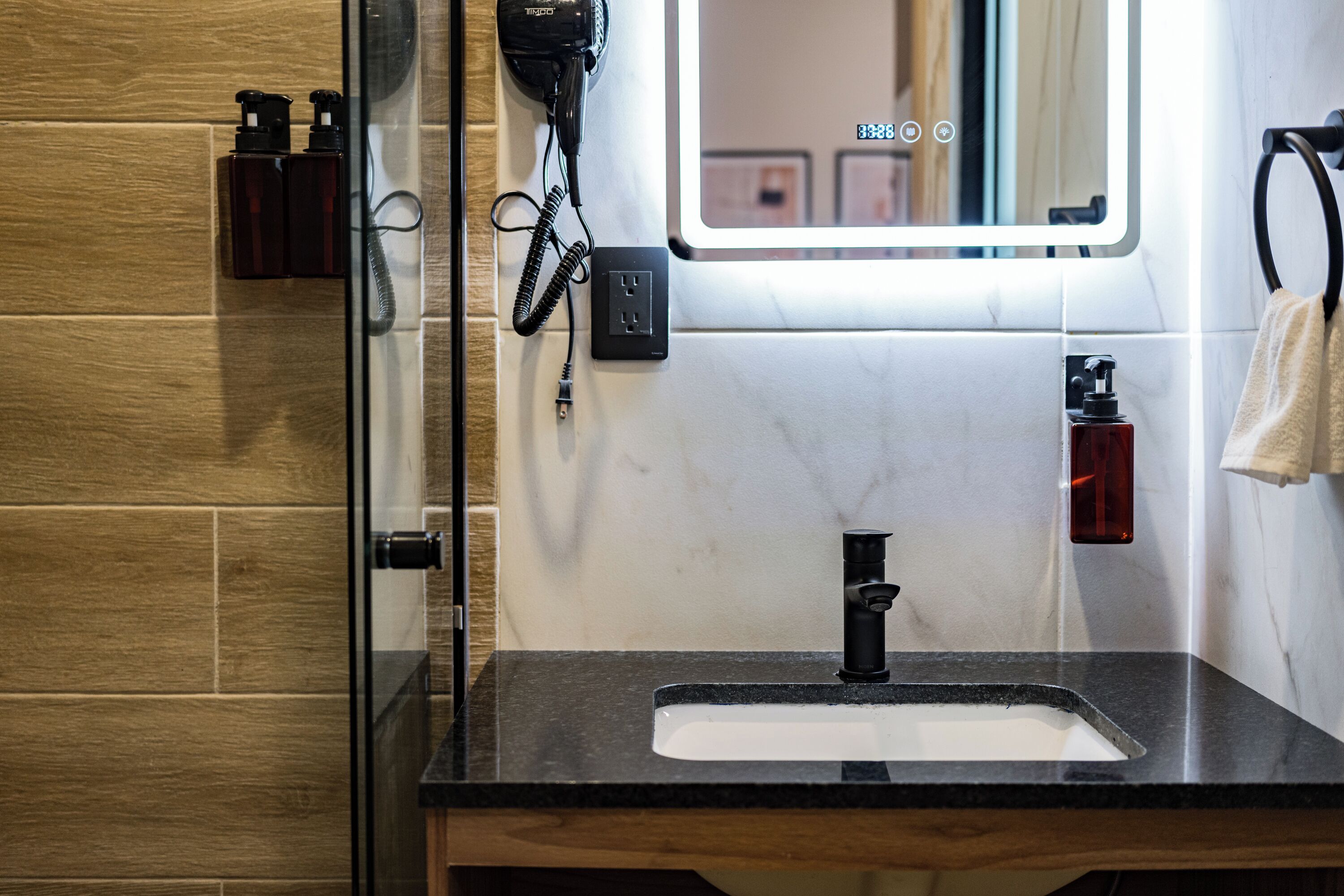 Shower, hair dryer, towels