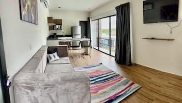 Habitación doble familiar | Área de sala de estar