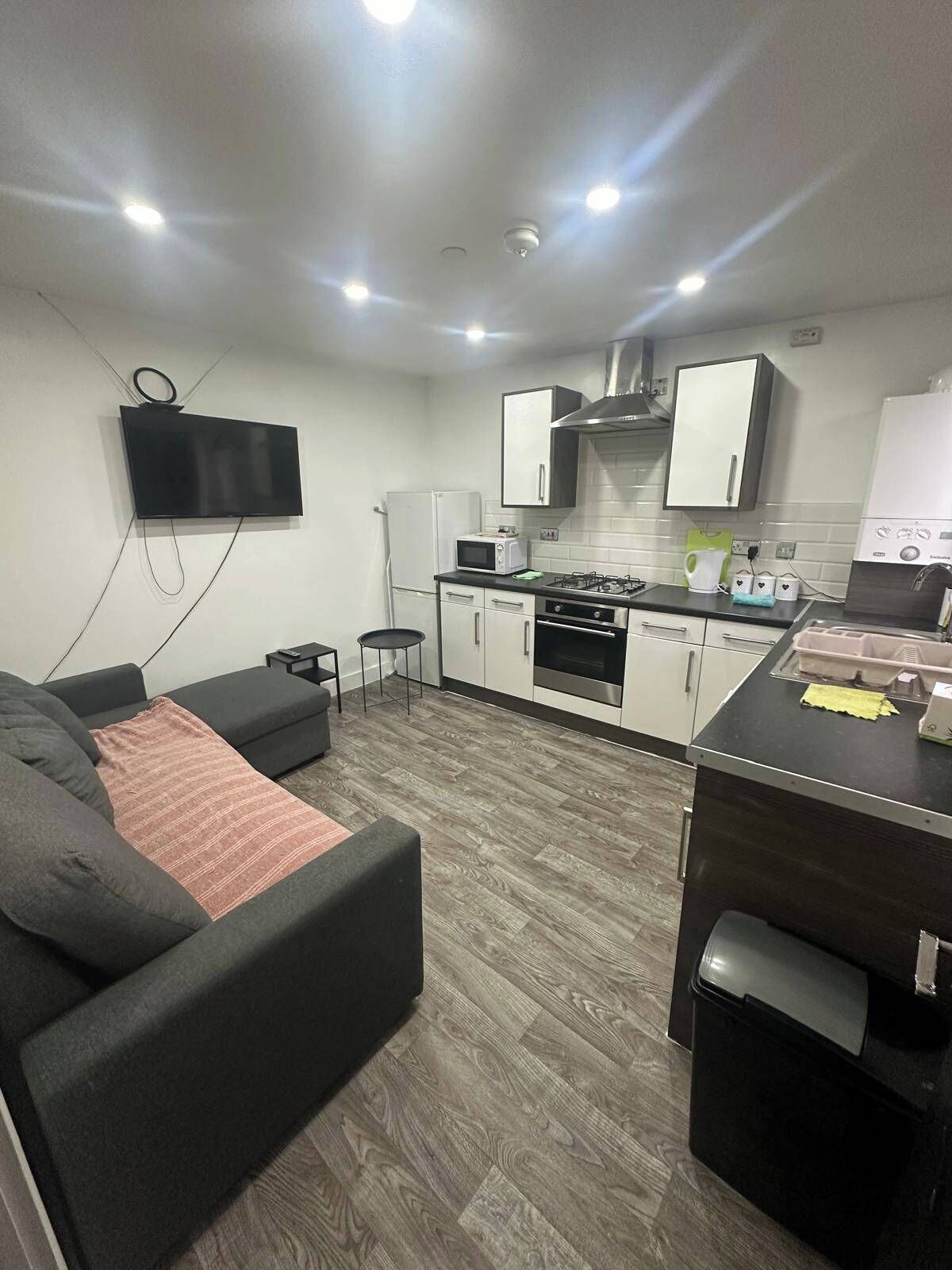 Apartamento | Área de estar | TV