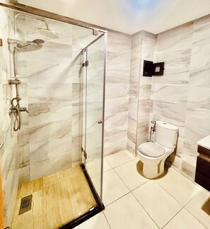 Hair dryer, bidet, towels, soap