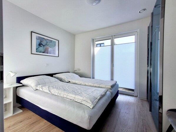 1 bedroom, desk, iron/ironing board, travel cot