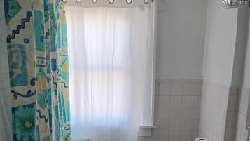 Jetted tub, hair dryer, towels, soap