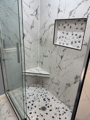 Shower, hair dryer, towels, soap