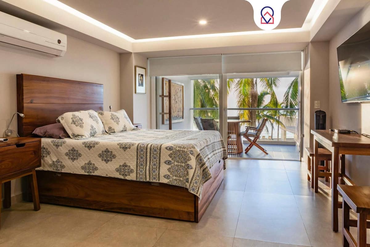 Appartamento Deluxe, vista piscina | 1 camera, postazione laptop, tende oscuranti, ferro/asse da stiro