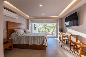 Deluxe Apartment, Pool View | 1 bedroom, laptop workspace, blackout drapes, iron/ironing board